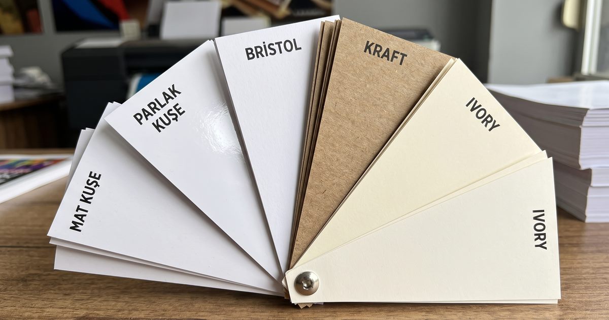 Paper samples of different weights and types laid out side by side